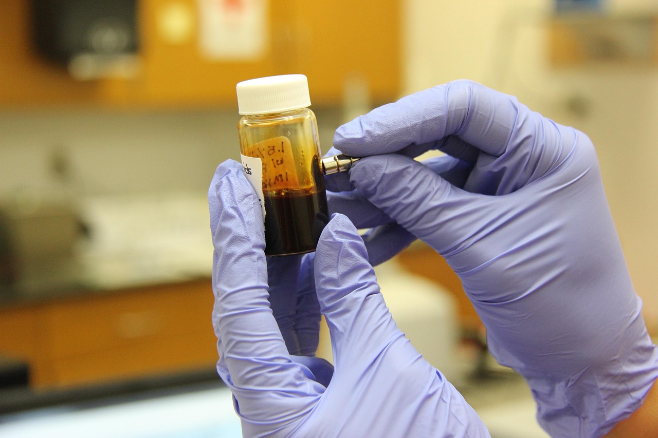 Researcher examining samples in a pharmaceutical laboratory