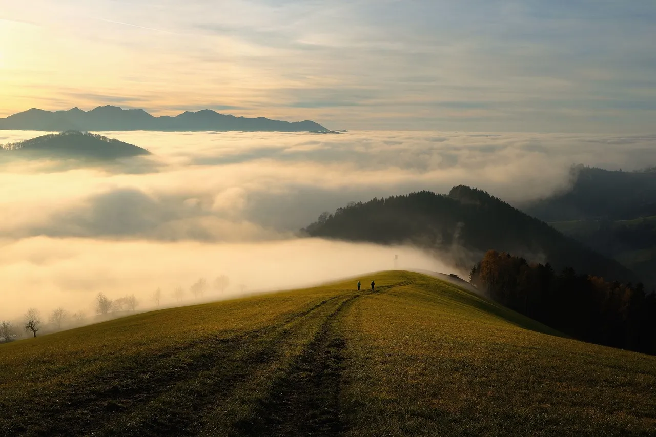 Mountains, fog, sky — illustrating Blood PhenoAge vs Epigenetic Clock Tests