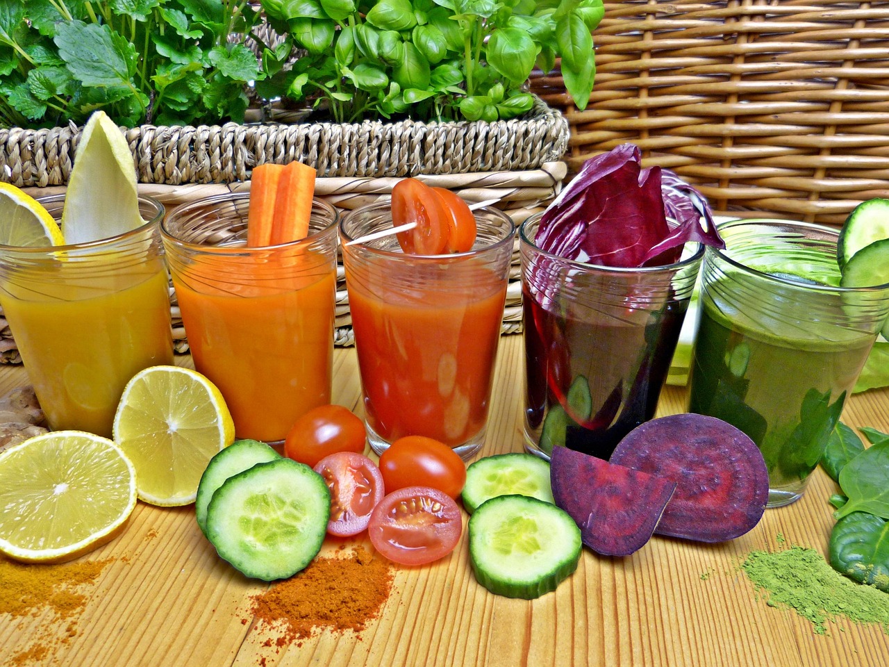 Assortment of fresh vegetables and juices associated with supporting digestive and gut health