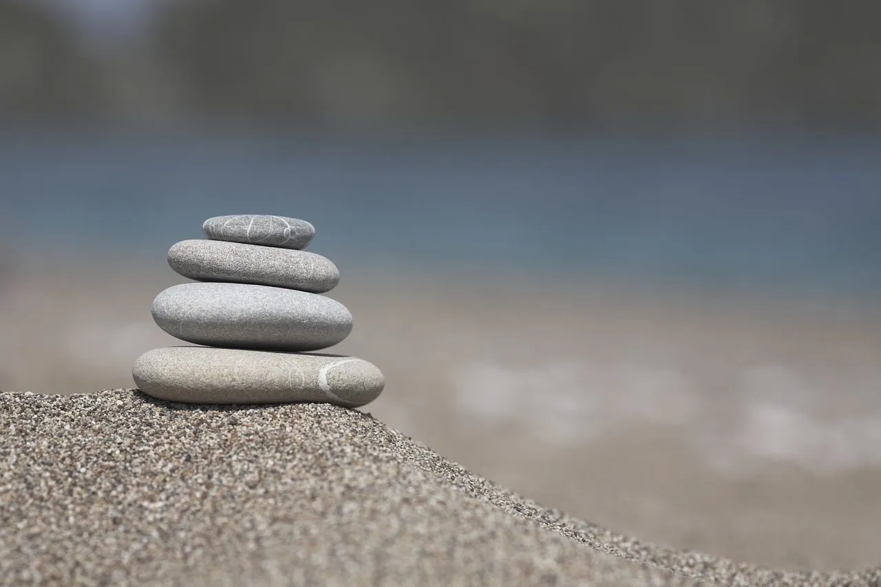 Stones, balance, meditation — illustrating Counting Volume for Compound Lifts: Fractional vs Whole Sets