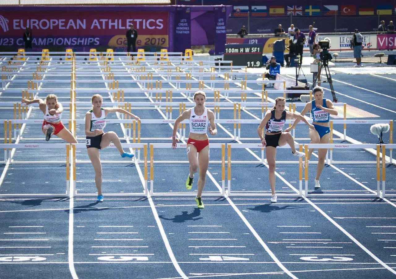Running, hurdles, athletics — illustrating Does Cold Water Immersion Really Help?