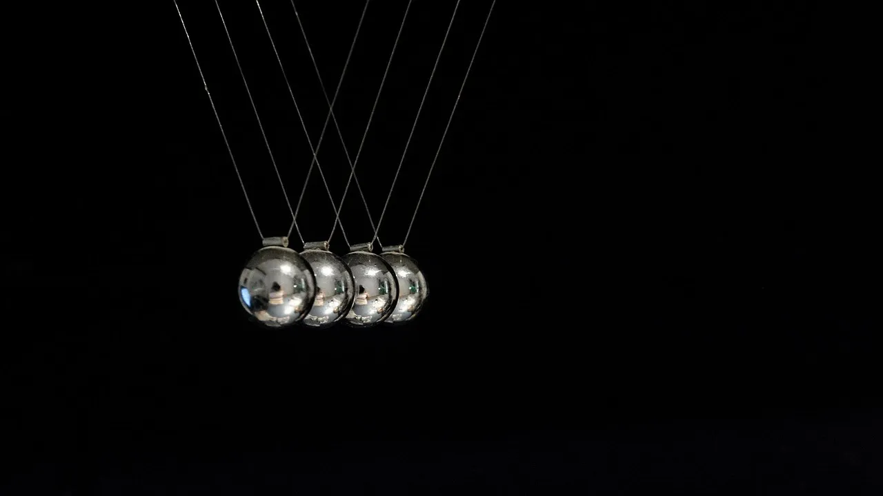 Pulse, newton pendulum, physics — illustrating Does Adding More Bacteriostatic Water Make a Vial Last Longer?