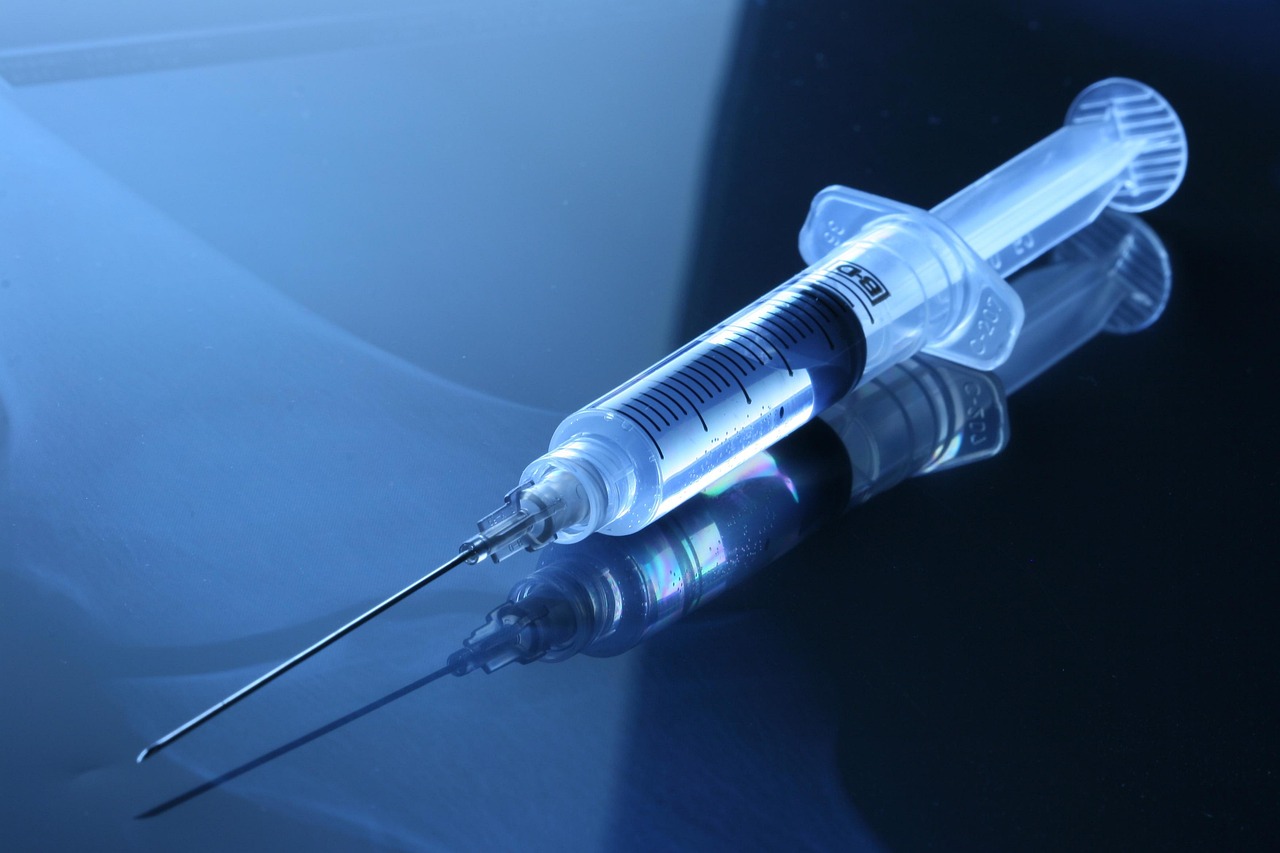 Medical, syringe, vaccination — illustrating GLP-1 Dosing and Titration: Why Slow Wins