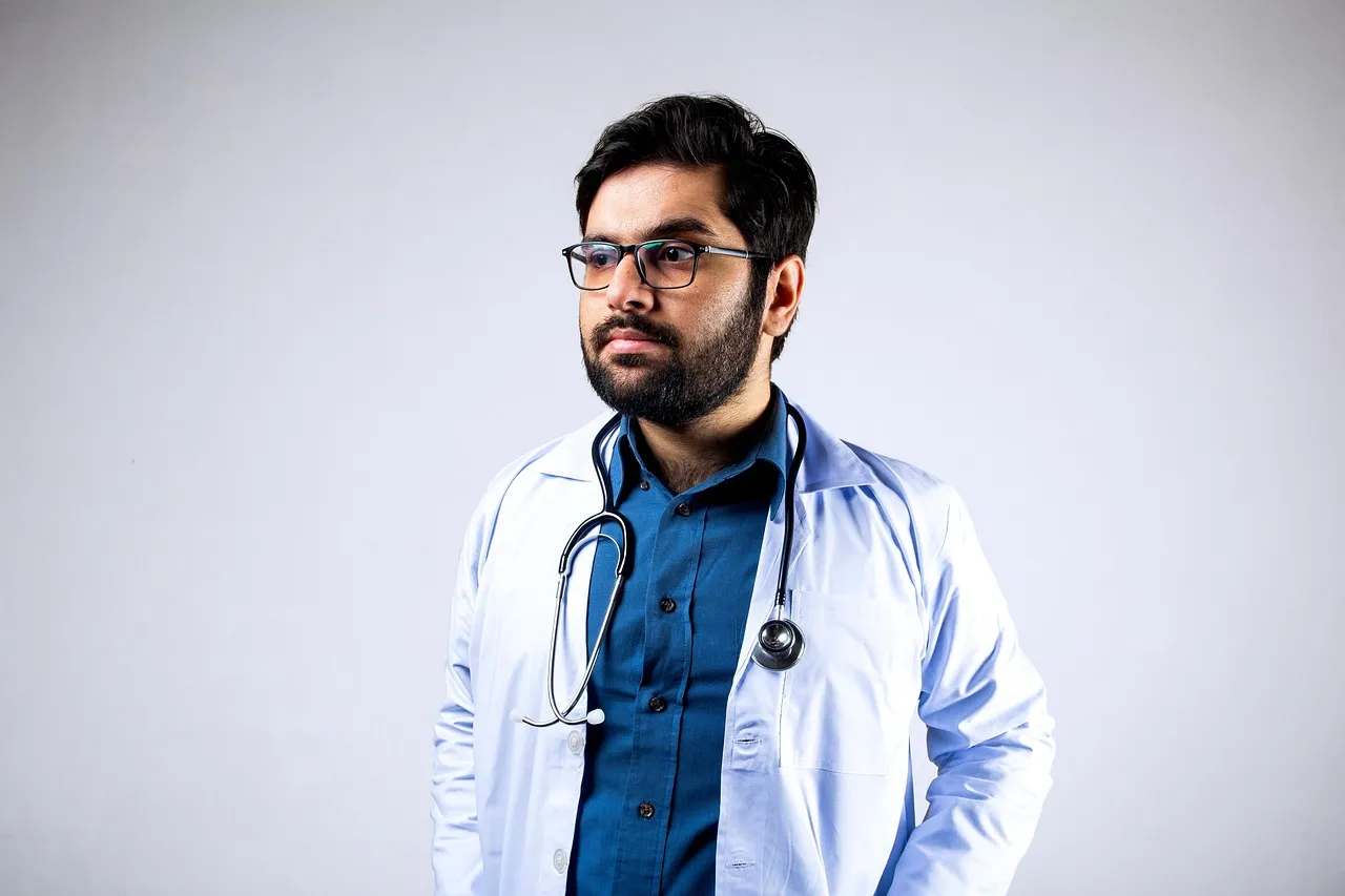 Doctor, stethoscope, man — illustrating How Much GLP-1 Weight Loss Is Fat vs Muscle?