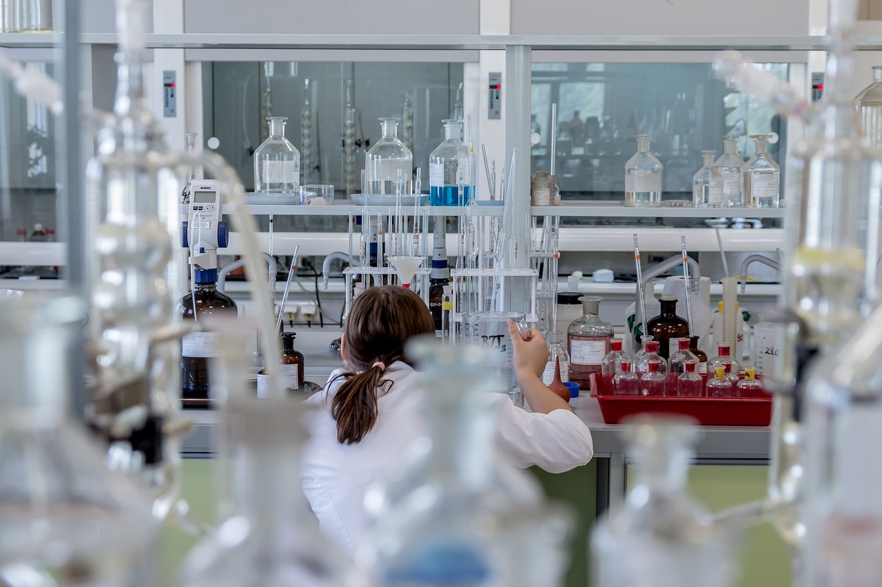 Scientist examining chemical samples in a research laboratory