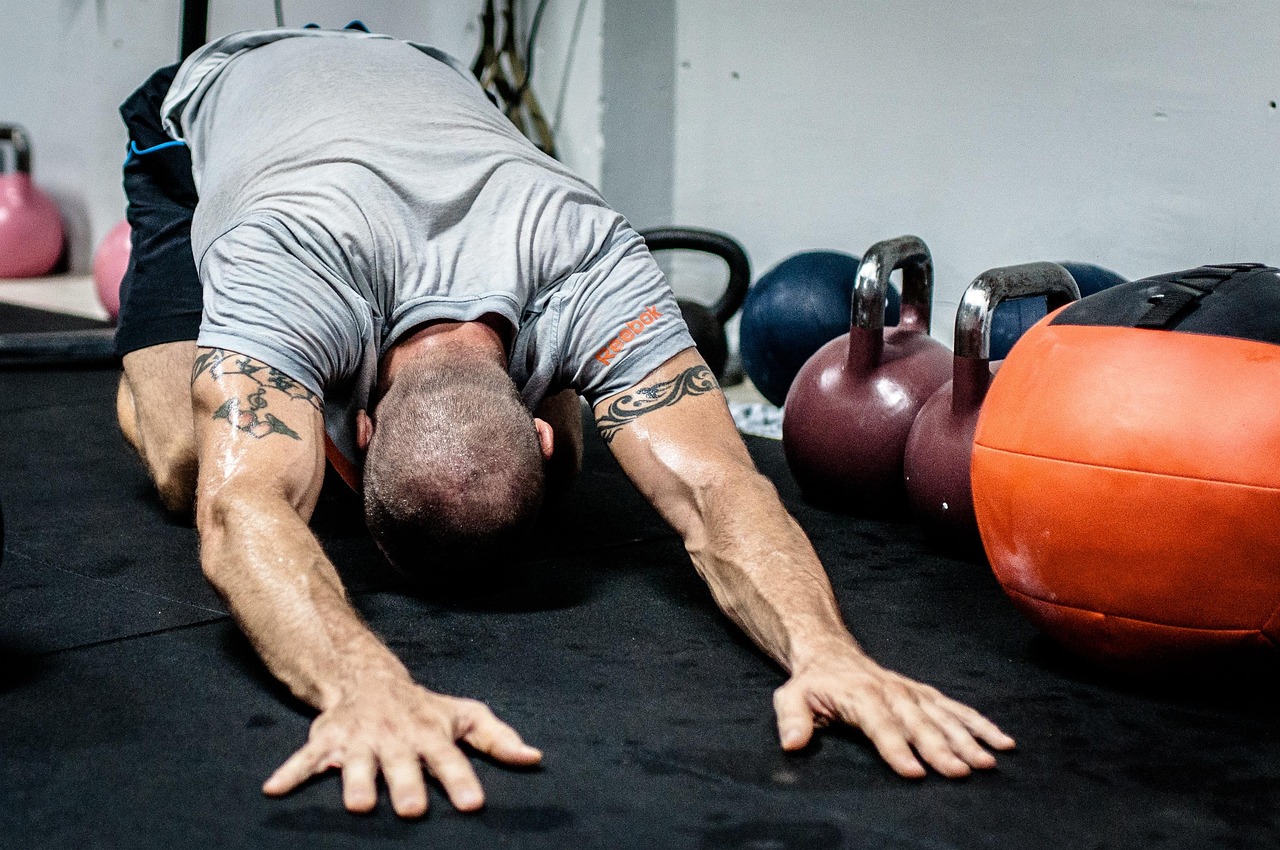 Kettlebell, stretching, fitness — illustrating Heat Acclimation and Adaptation