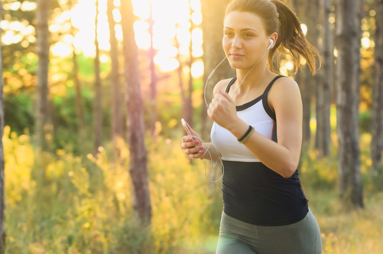 Woman, jogging, running — illustrating HRV-Guided Training: Does Listening to Your Nervous System Work?