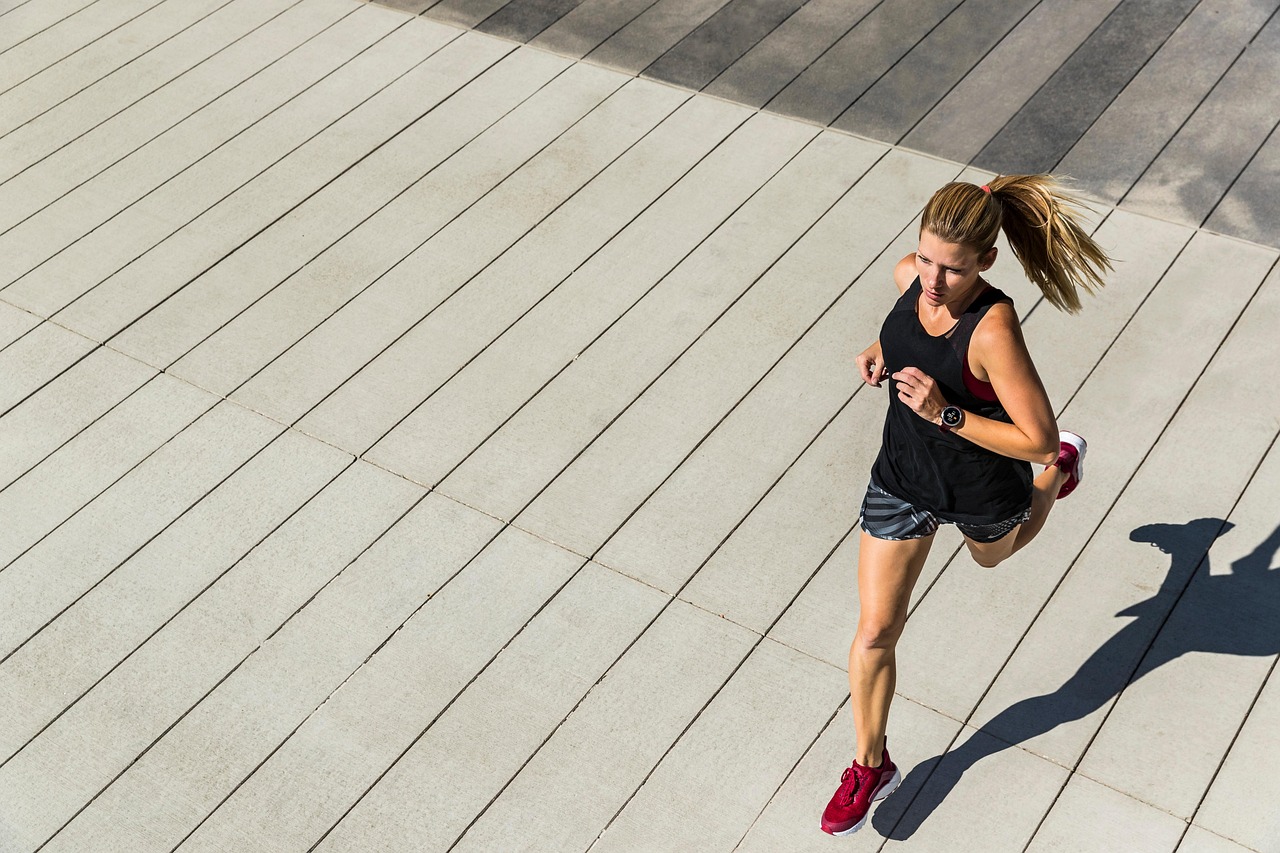 Running, woman, fitness — illustrating HRV-Guided Training: Does Listening to Your Nervous System Work?