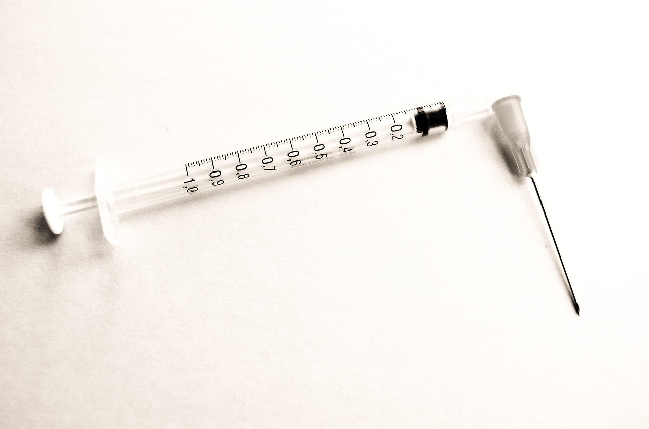 Stop, vaccinations, health — illustrating Injection Technique and Peptides: What the Research Suggests