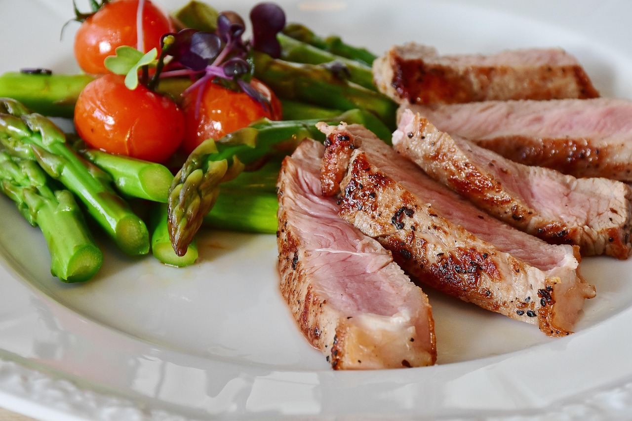 Asparagus, steak, veal steak — illustrating Managing GLP-1 Nausea: What the Evidence Suggests