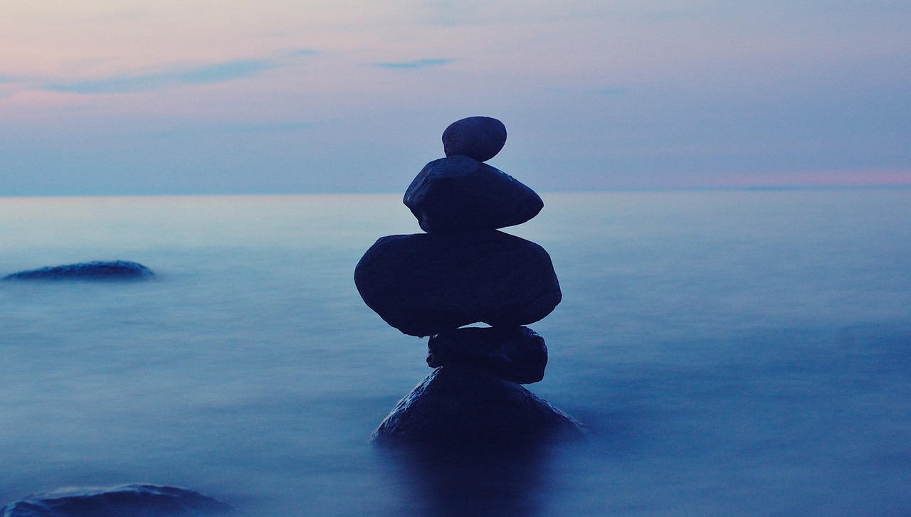 Balance, stones, nature — illustrating MEV, MAV, MRV: Volume Landmarks Explained