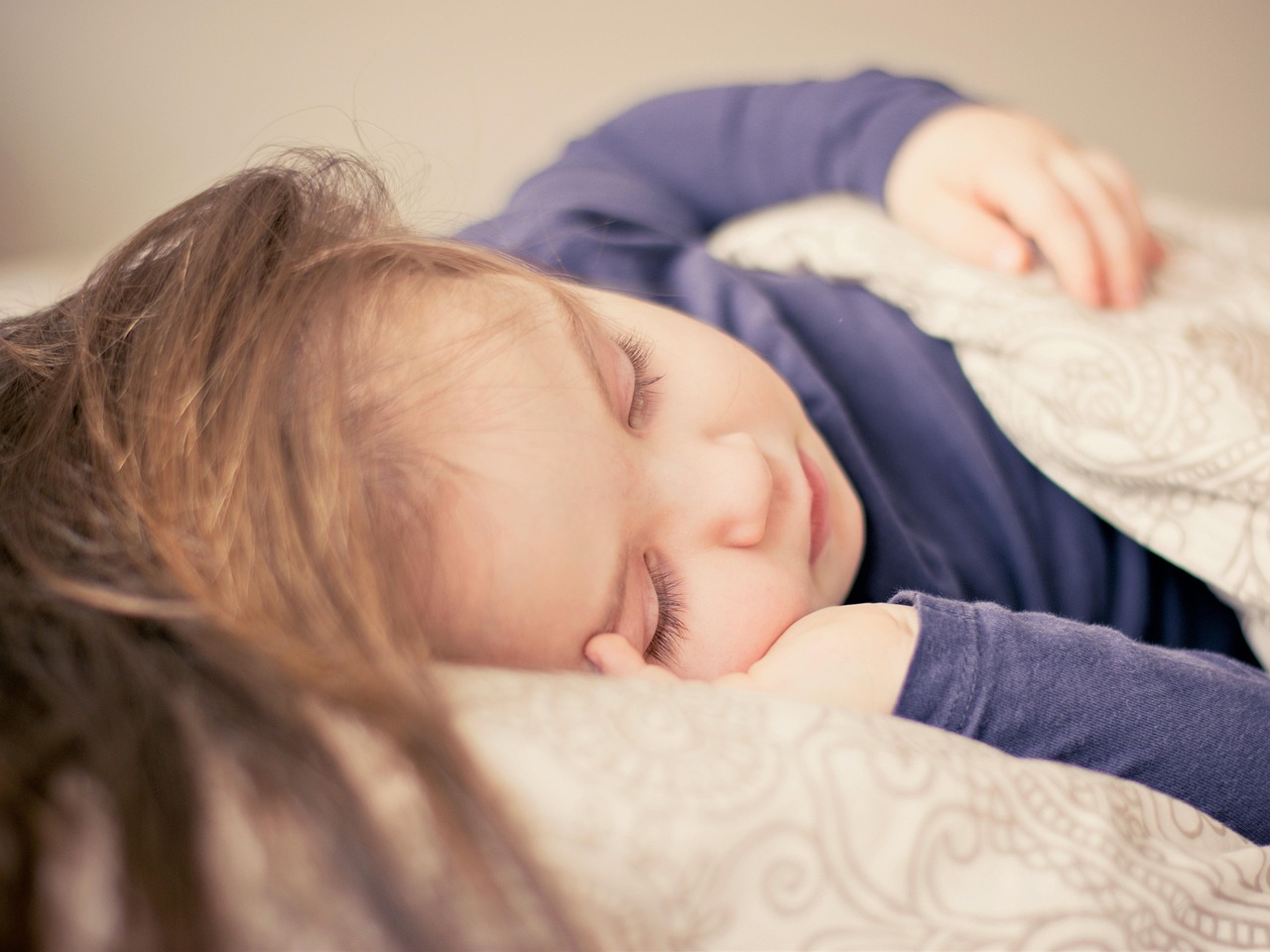 Baby, girl, sleep — illustrating Naps and Recovery: Dose and Timing