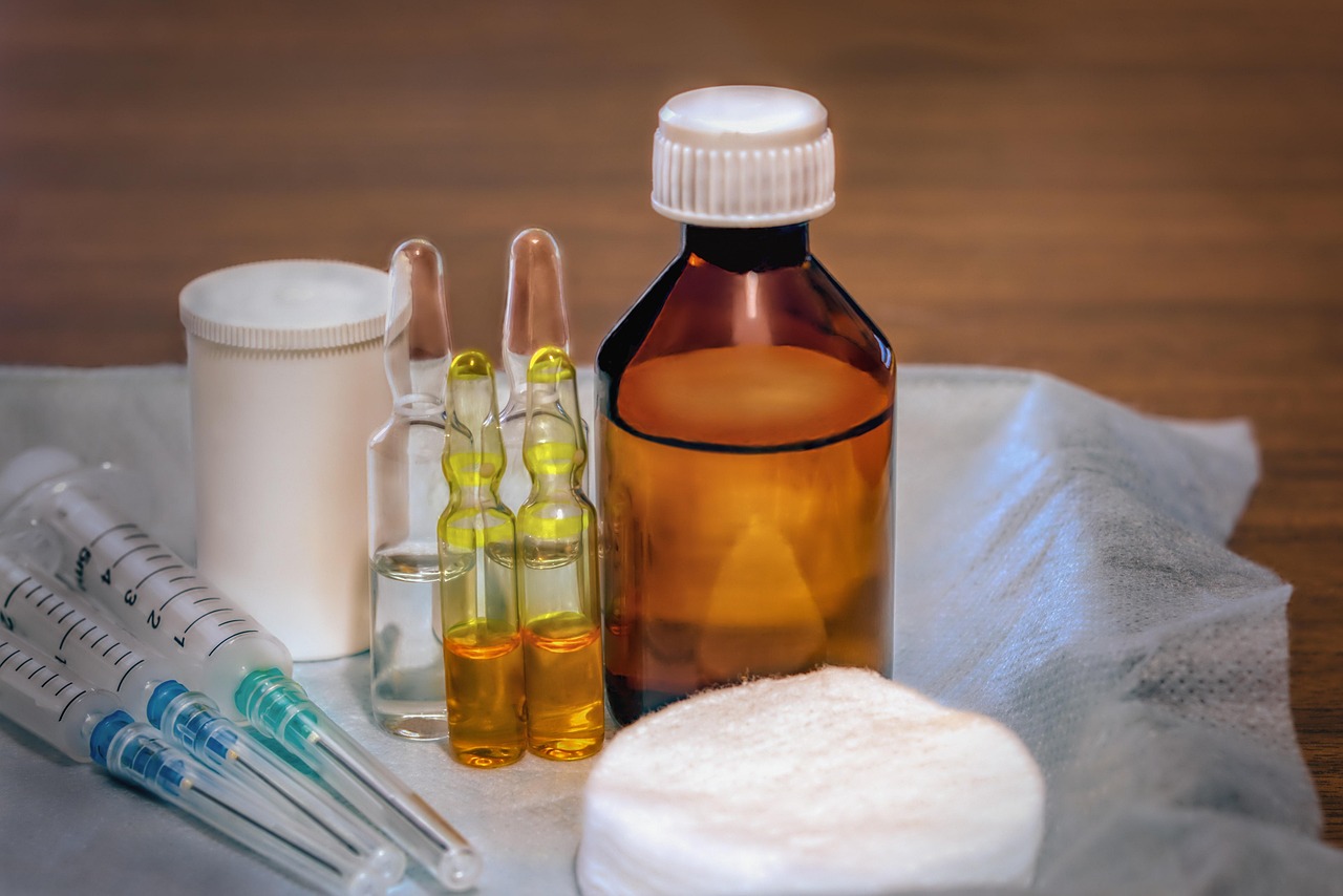 Ampoules, syringes, cotton pads — illustrating Peptide Half-Life, Explained: Why Dosing Frequency Varies