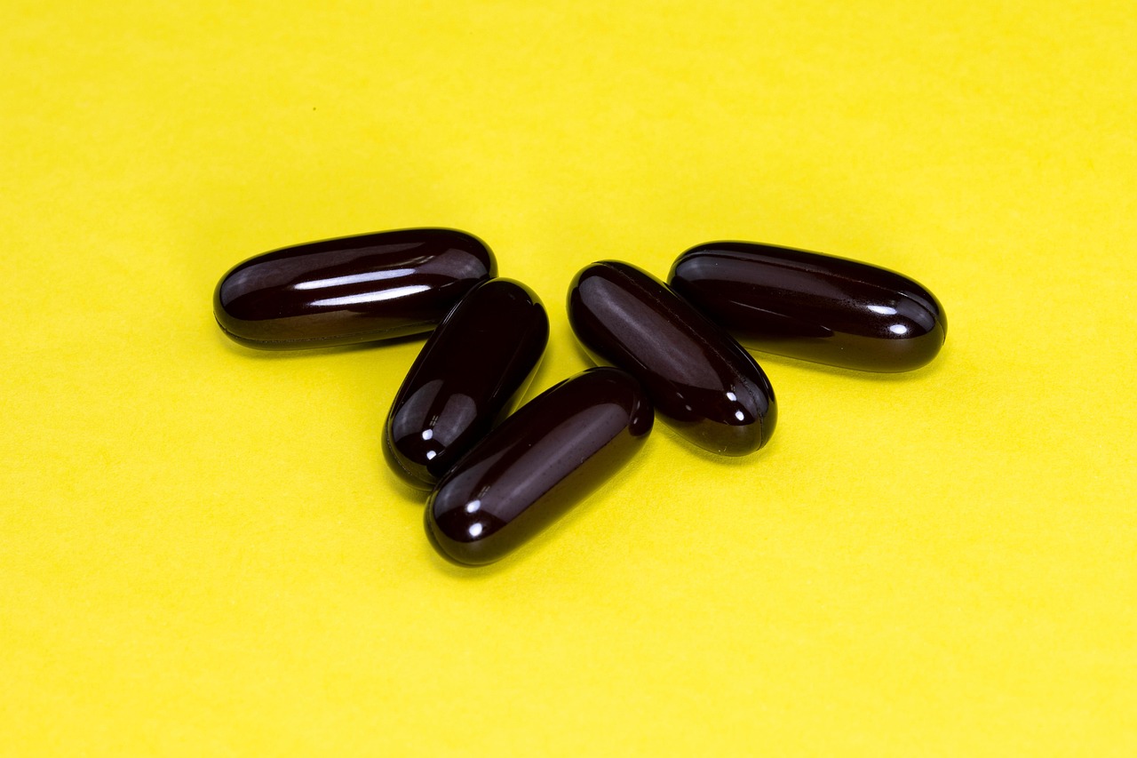 Capsules, medicine, supplement — illustrating Polyphenols and Aging: Beyond the Headlines