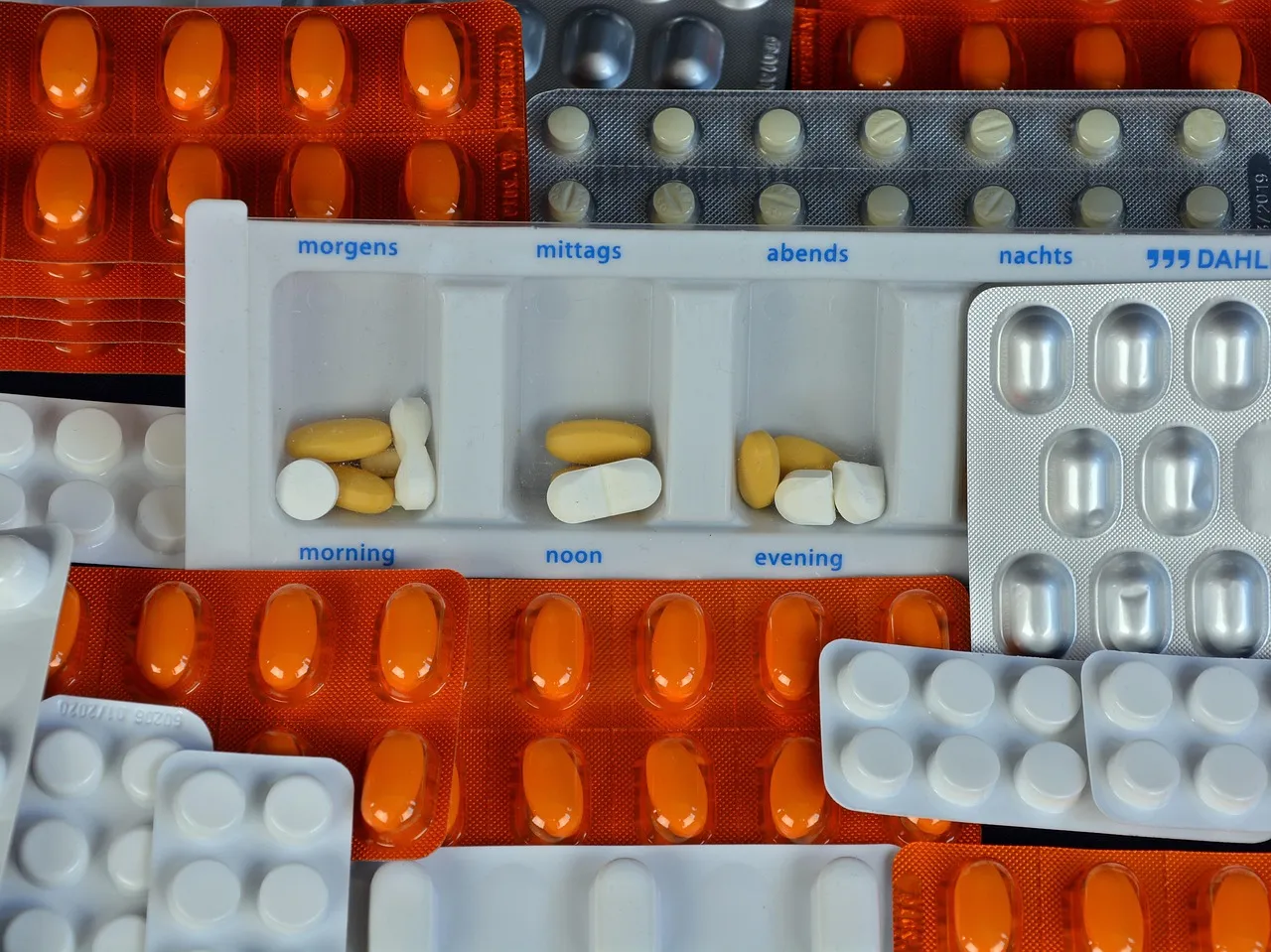 Tablets, medicine, health — illustrating How Much Protein to Keep Muscle in a Calorie Deficit