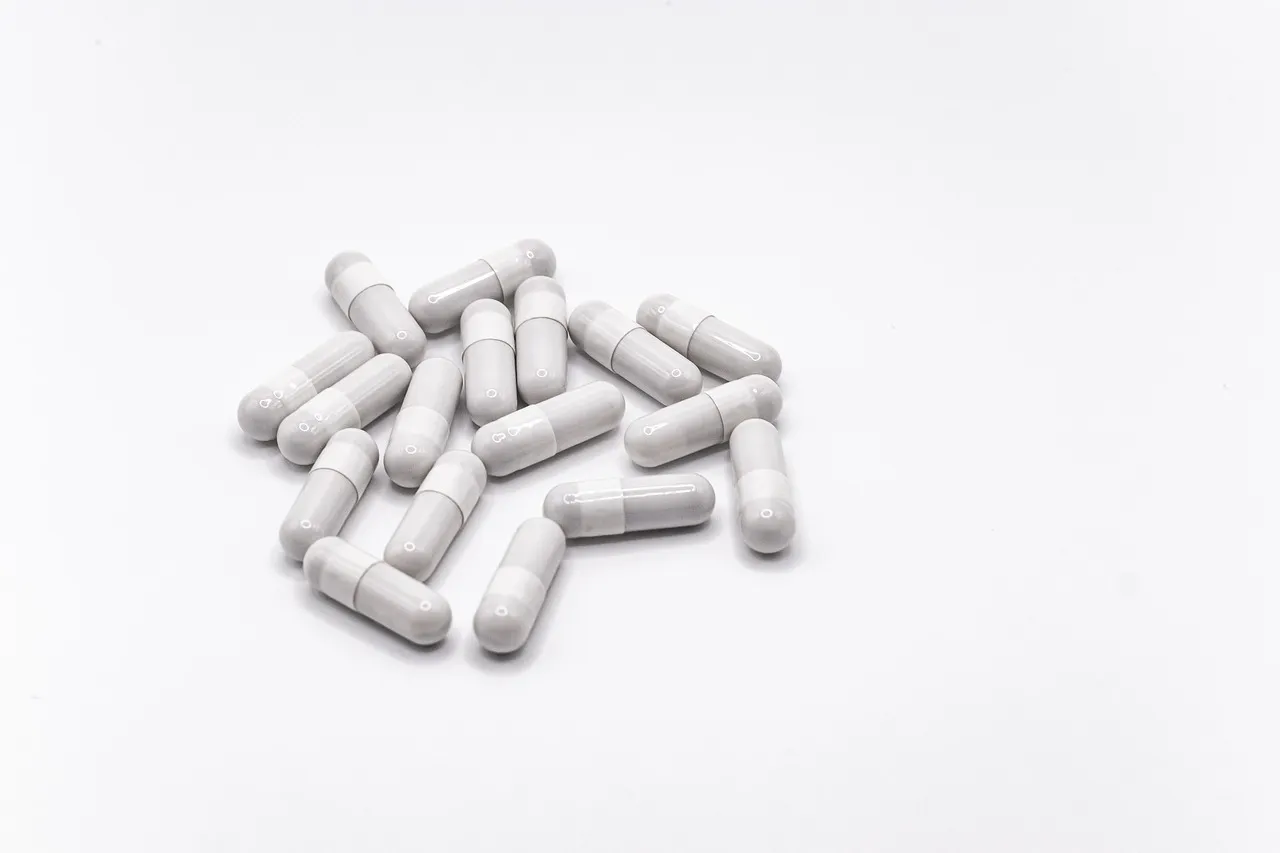 Pills, capsules, medicine — illustrating How Much Protein to Keep Muscle in a Calorie Deficit