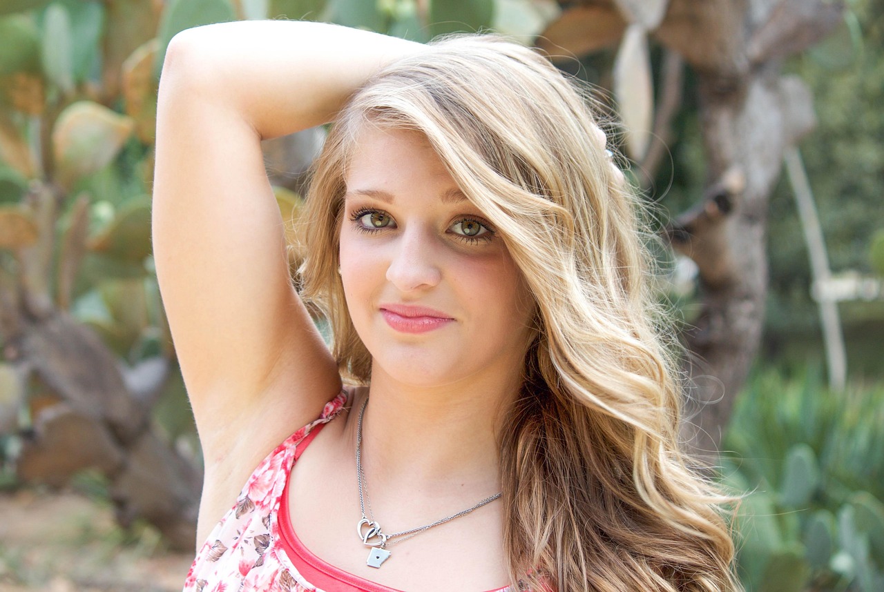 Girl, blonde, smile — illustrating Rapamycin and Longevity: What the Evidence Shows