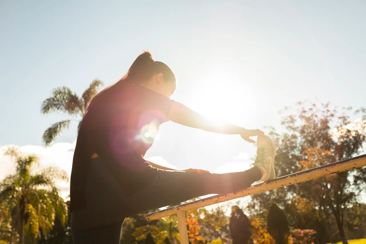Woman, stretch, stretching — illustrating Recovery and Aging: Why It Slows and What Helps