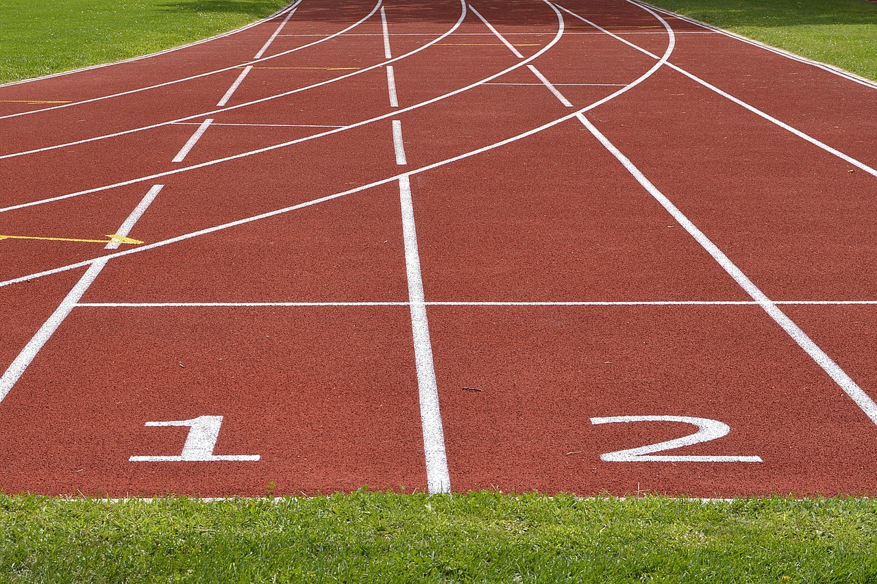 Tartan track, athletics, track and field — illustrating Recovery for Endurance vs Strength Athletes