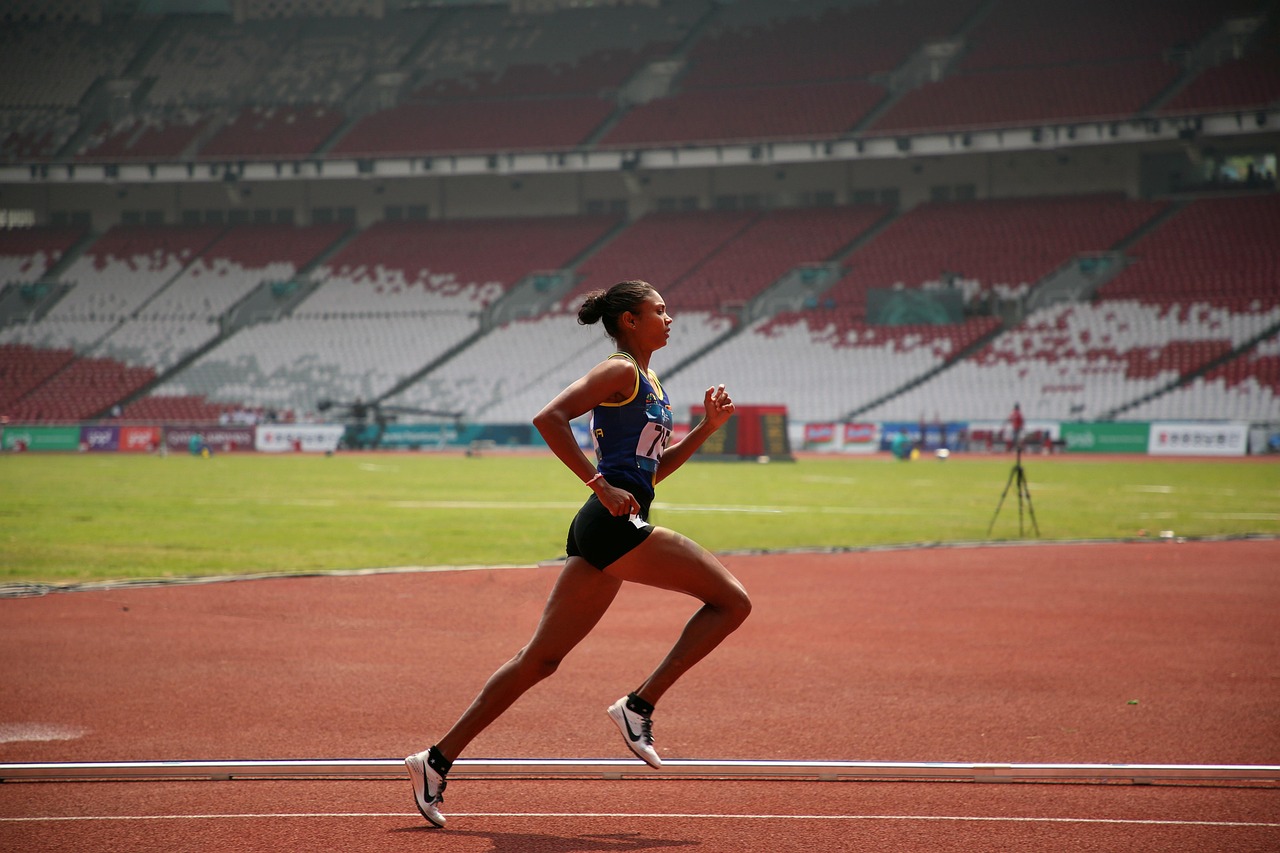 Woman, runner, sport — illustrating Recovery for Endurance vs Strength Athletes