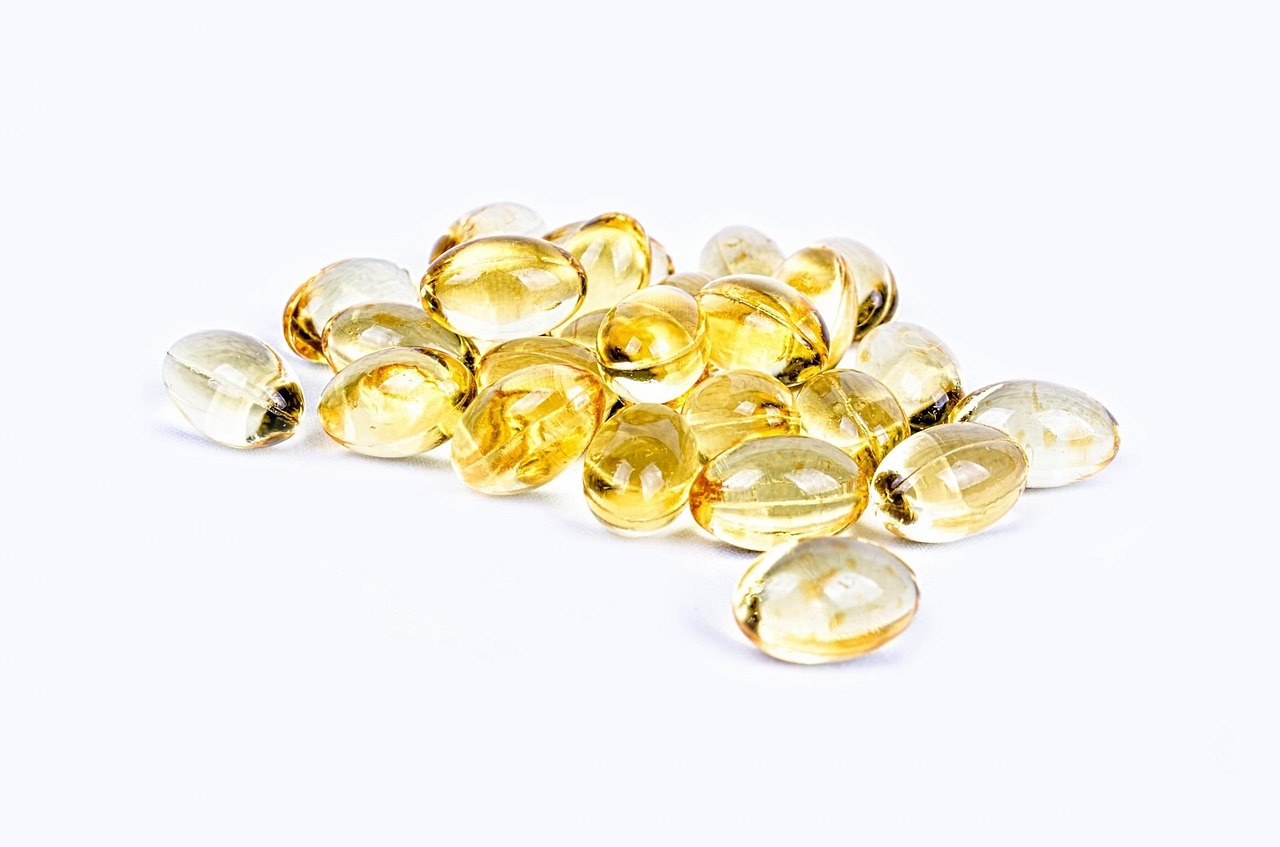 Pill, yellow, isolated — illustrating Recovery Supplements: What’s Actually Worth It?
