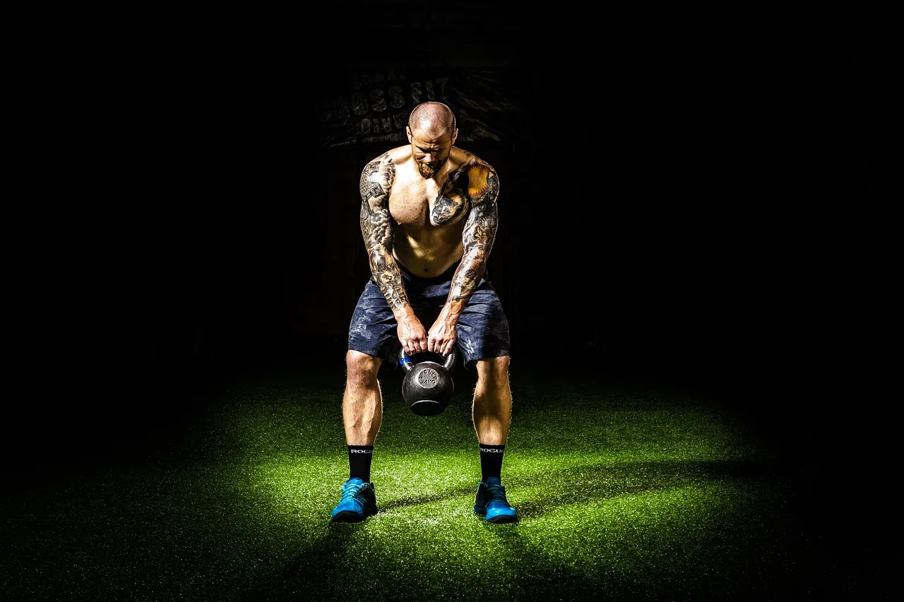 Dark, effort, exercise — illustrating The Science of Deloading: Why Less Builds More