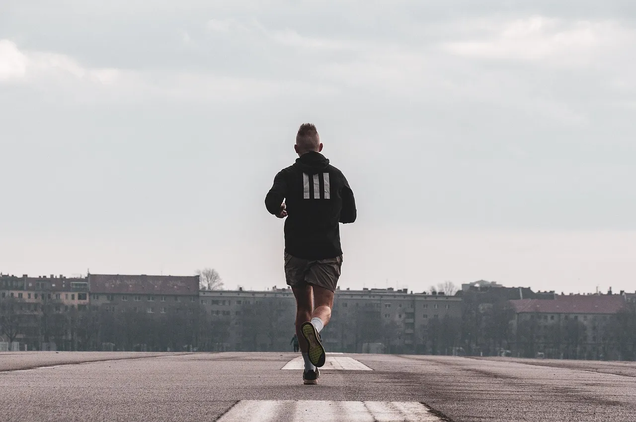 Runner, running, jog — illustrating VO2 Max Training: How to Actually Raise It