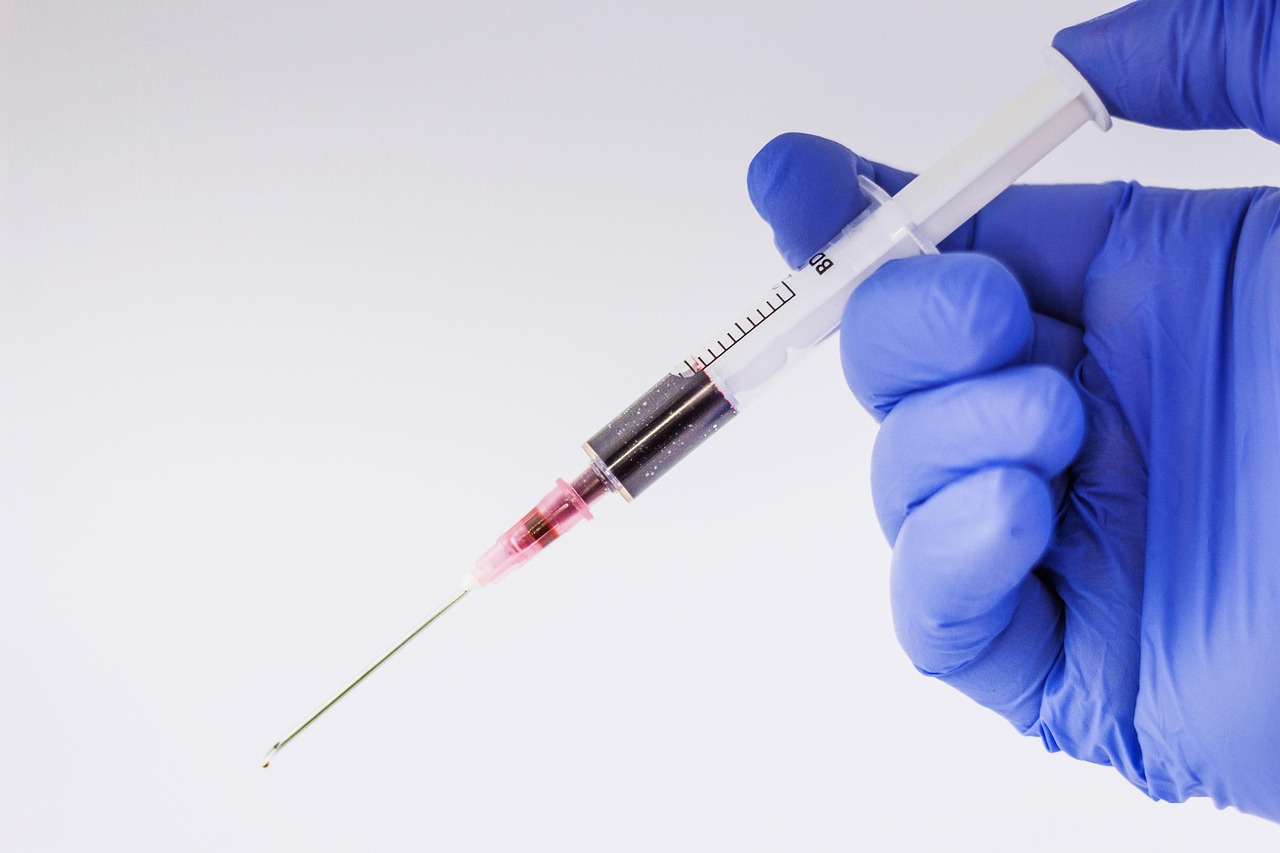 Syringe, glove, medical — illustrating Which Insulin Syringe Size for Peptides (U-100)