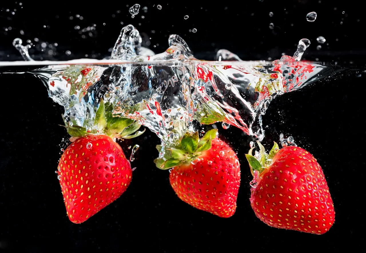 Fruit, strawberries, splash — illustrating Why Your TDEE Drops as You Lose Weight