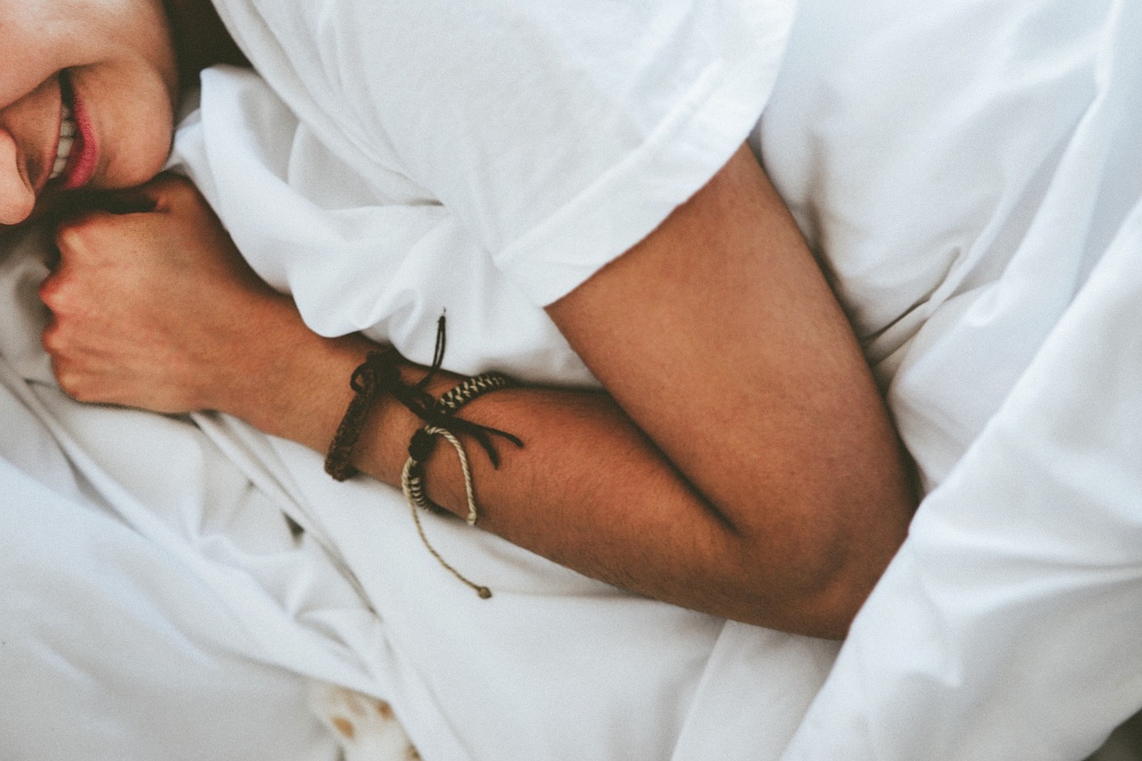 People, bed, sleeping — illustrating The Complete Guide to Sleep for Athletes