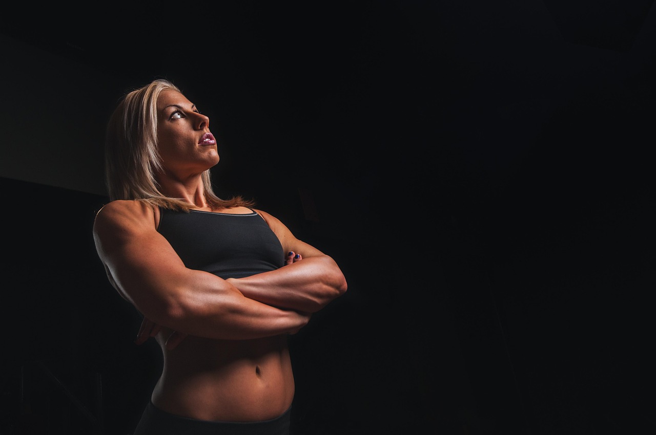 Training, arms, blonde — illustrating GLP-1s and Muscle: The Complete Guide to Protecting Lean Mass