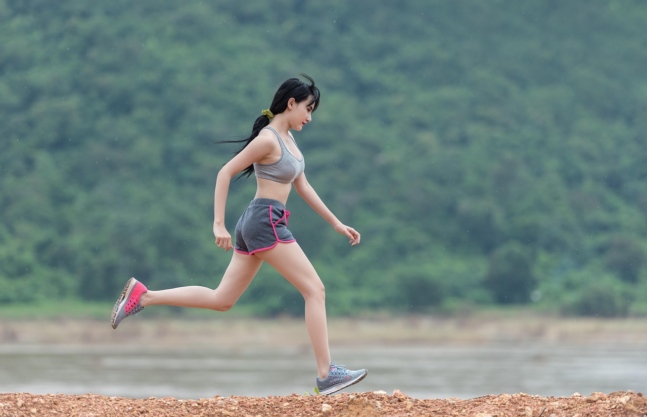 Woman, running, run — illustrating The HRV Guide: Reading Your Recovery Data