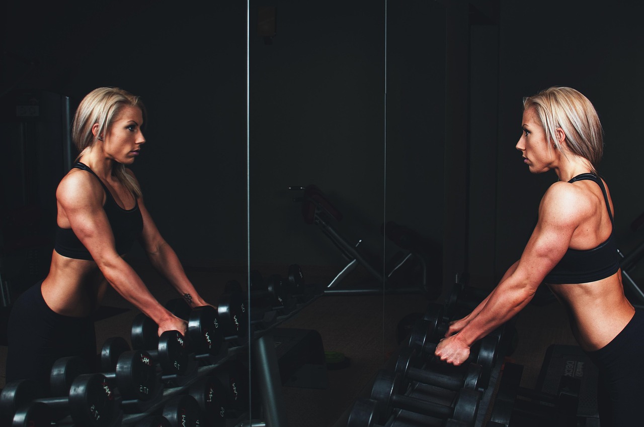 Training, muscles, arms — illustrating Strength Training for Longevity: A Complete Guide